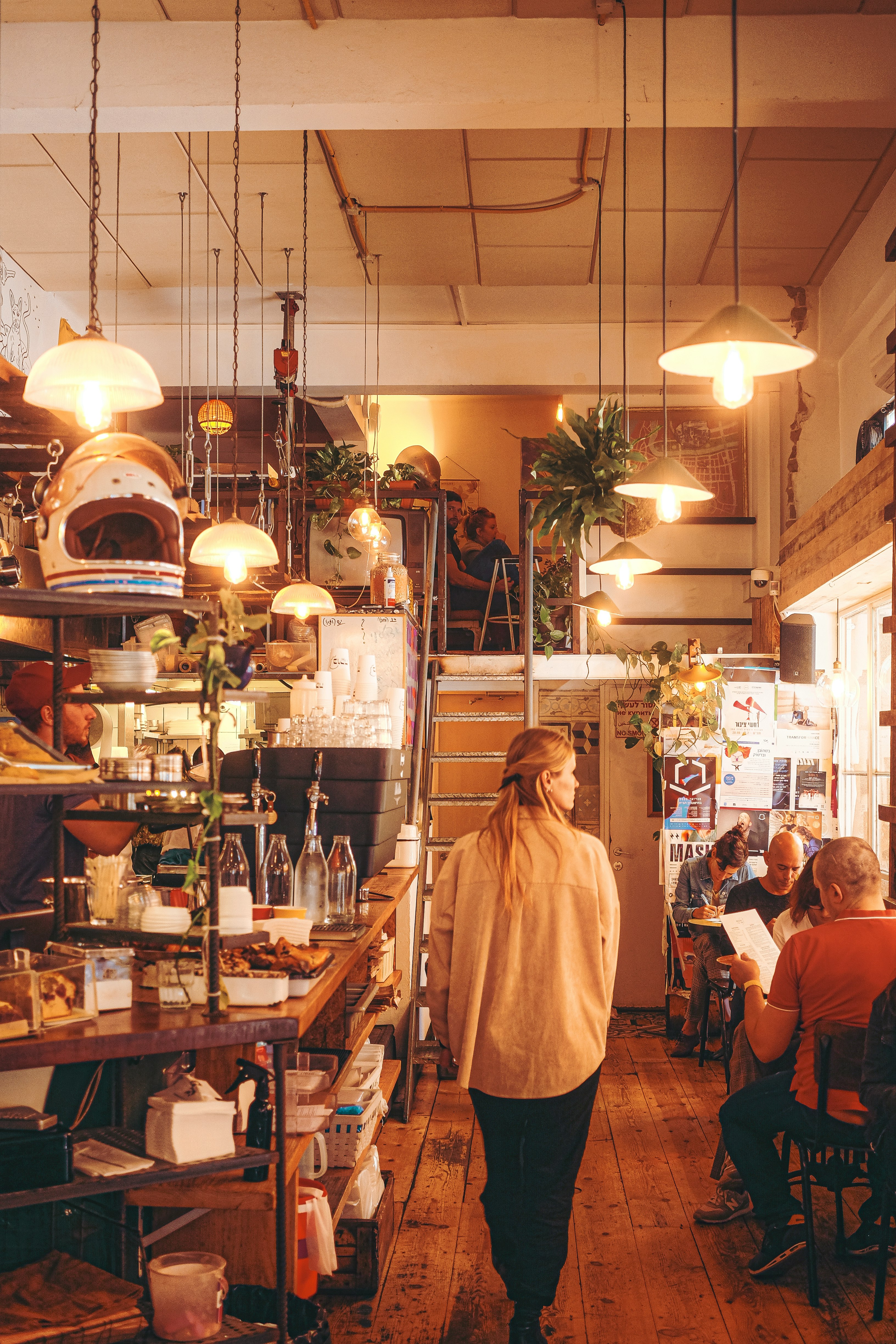 people sitting on chair inside restaurant